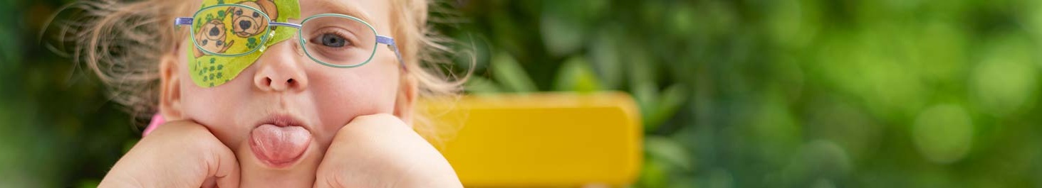 Entête Fille avec cache oculaire ORTOPAD® « Chiens », sort la langue